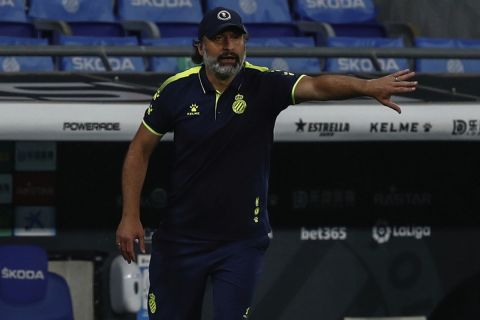 Espanyol's head coach Francisco Rufete gestures during the Spanish La Liga soccer match between RCD Espanyol and Real Madrid at the Cornella-El Prat stadium in Barcelona, Spain, Sunday, June 28, 2020. (AP Photo/Joan Monfort)