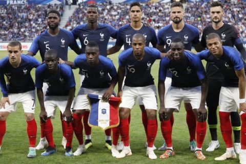 In this photo taken on Saturday, June 9, 2018, France players pose for a photo prior the friendly soccer match between France and USA at the Groupama stadium in Decines, near Lyon, central France (AP Photo/Laurent Cipriani)