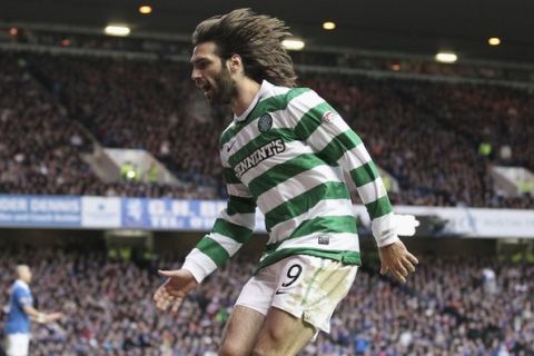 GLASGOW, SCOTLAND - JANUARY 02:    Georgios Samaras of Celtic celebrates after he scored the first goal during the Clydesdale Bank Premier League match between Rangers and Celtic at Ibrox Stadium on January 2, 2011 in Glasgow, Scotland.  (Photo by Jeff J Mitchell/Getty Images)