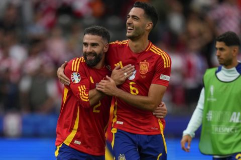 Spain players celebrate at the end of a Group B match between Spain and Croatia at the Euro 2024 soccer tournament in Berlin, Germany, Saturday, June 15, 2024. Spain defeated Croatia 3-0. (AP Photo/Manu Fernandez)