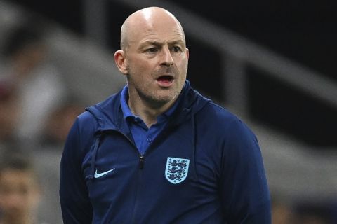 England's head coach Lee Carsley directs his players during the Euro 2023 U21 Championship final soccer match between England and Spain at the Batumi Arena stadium in Batumi, Georgia, Saturday, July 8, 2023. (AP Photo/Tamuna Kulumbegashvili)