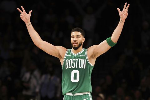 Boston Celtics' Jayson Tatum reacts in the second half of an NBA basketball game against the Brooklyn Nets, Wednesday, Nov. 13, 2024, in New York. (AP Photo/Heather Khalifa)