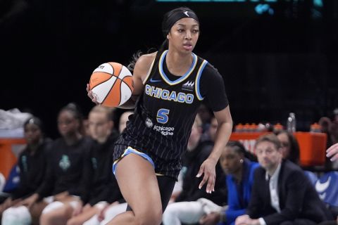 Chicago Sky's Angel Reese brings the ball up during the second half of the team's WNBA basketball game against the New York Liberty, Thursday, May 23, 2024, in New York. The Sky won 90-81. (AP Photo/Frank Franklin II)