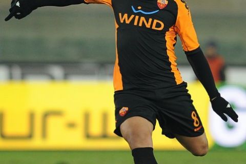 AS Roma Brazilian forward Adriano  kicks the ball during Italian serie A football match Chievo vs AS Roma, on December 4, 2010, at Marc'Antonio Bentegodi stadium in Verona. AFP PHOTO / ALBERTO PIZZOLI (Photo credit should read ALBERTO PIZZOLI/AFP/Getty Images)