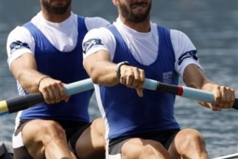 Team of Greece, Nikolaos Gkountoulas, left, and Apostolos  Gkountoulas compete in the Men's Pair Repechage event at the World Rowing Championships in Bled, Slovenia, Tuesday, Aug. 30, 2011. ( AP Photo/Filip Horvat)