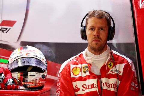 SOCHI, RUSSIA - APRIL 30: Sebastian Vettel of Germany and Ferrari in the garage during qualifying for the Formula One Grand Prix of Russia at Sochi Autodrom on April 30, 2016 in Sochi, Russia.  (Photo by Mark Thompson/Getty Images)