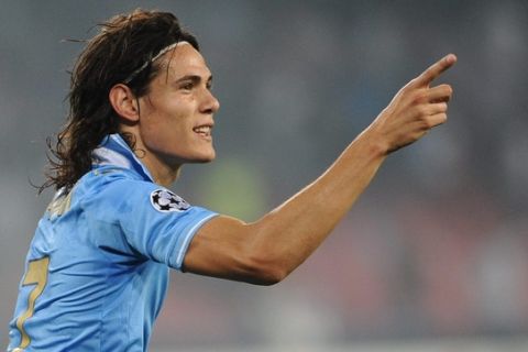 Napoli's Uruguayan forward Edinson Roberto Cavani celebrates after scoring against Villareal during their Champions League Group A football match at San Paolo stadium in Naples on September 27, 2011.        AFP PHOTO / VINCENZO PINTO (Photo credit should read VINCENZO PINTO/AFP/Getty Images)