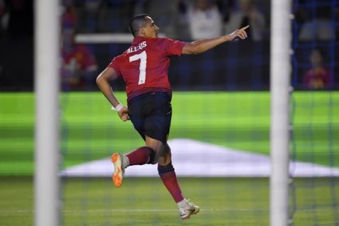 Manchester United forward Alexis Sanchez celebrates after scoring during the first half of an International Champions Cup tournament soccer match against AC Milan Wednesday, July 25, 2018, in Carson, Calif. (AP Photo/Mark J. Terrill)