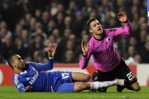 FC Copenhagen's Martin Vingaard, right, is tackled by Chelsea's Jose Bosingwa during their Champions League  round of 16 soccer match at the Stamford Bridge stadium, London, Wednesday, March 16, 2011. (AP Photo/Tom Hevezi)