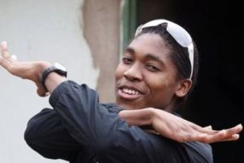 South African athlete Caster Semenya gestures during her celebration at the Ga-Masehlong village in Moletjie, 65km from Polokwane, South Africa, Friday Aug. 28, 2009. Villagers in northern South Africa celebrated and supported their world track champion Friday, refusing to let questions about her gender mute the mood during Caster Semenya's first visit home since the controversy erupted.. (AP Photo/Themba Hadebe)