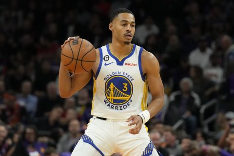 Golden State Warriors guard Jordan Poole (3) during the first half of an NBA basketball game against the Phoenix Suns, Tuesday, Oct. 25, 2022, in Phoenix. (AP Photo/Rick Scuteri)