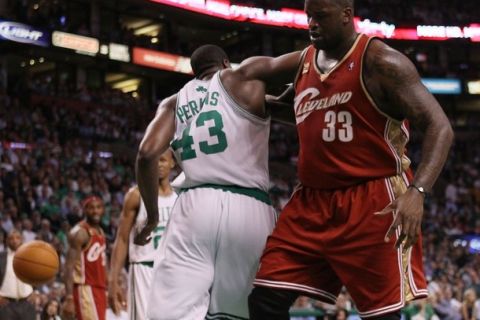 BOSTON - MAY 13:  Kendrick Perkins #43 of the Boston Celtics and Shaquille O'Neal #33 of the Cleveland Cavaliers fight for the ball during Game Six of the Eastern Conference Semifinals of the 2010 NBA playoffs at TD Garden on May 13, 2010 in Boston, Massachusetts. The Celtics defeated the Cavaliers 94-85.  NOTE TO USER: User Expressly Acknowledges and agrees that, by downloading and or using this photograph, User is consenting to the terms and conditions of the Getty Images License Agreement.  (Photo by Elsa/Getty Images)