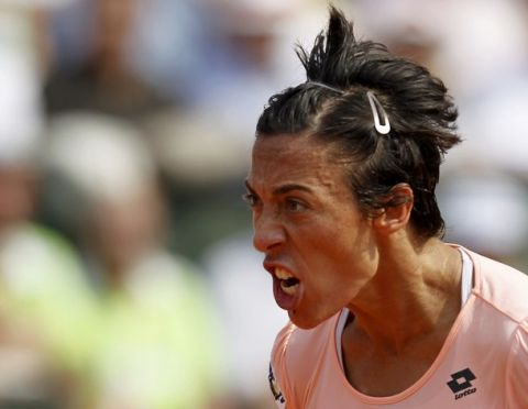 Francesca Schiavone of Italy reacts during her women's final against Li Na of China at the French Open tennis tournament at the Roland Garros stadium in Paris June 4, 2011.           REUTERS/Charles Platiau (FRANCE  - Tags: SPORT TENNIS)