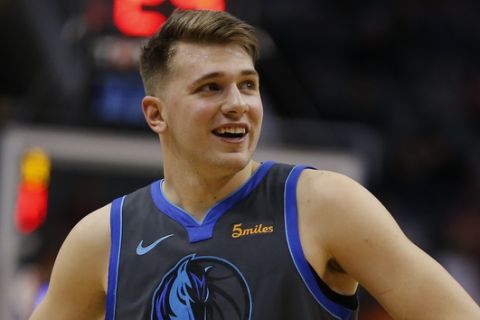 Dallas Mavericks forward Luka Doncic (77) in the first half during an NBA basketball game against the Phoenix Suns, Thursday, Dec. 13, 2018, in Phoenix. (AP Photo/Rick Scuteri)