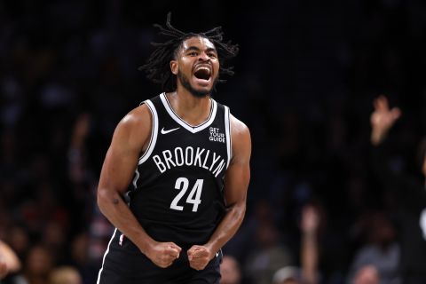 Brooklyn Nets guard Cam Thomas (24) reacts after scoring against the Milwaukee Bucks during the second half of an NBA basketball game, Sunday, Oct. 27, 2024, in New York. (AP Photo/Noah K. Murray)