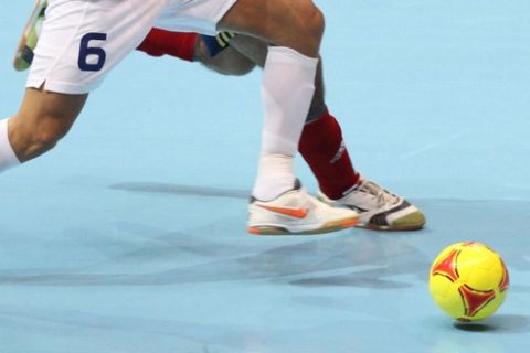 Gabriel of Brazil  left, and Fernandao of Spain gofor the ball during their FIFA Futsal World Cup final match in Bangkok, Thailand Sunday , Nov. 18, 2012. Brazil beat Spain 3-2.(AP Photo)