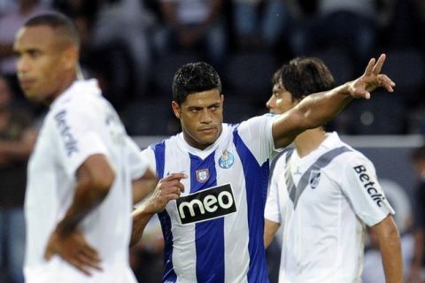 Porto's Brazilian forward ''Hulk'' Souza (C) celebrates after scoring a goal during the Portuguese league football match Vitoria Guimaraes vs FC Porto at Afonso Henriques Stadium in Guimaraes, northern Portugal, on August 14, 2011.  AFP PHOTO / FRANCISCO LEONG (Photo credit should read FRANCISCO LEONG/AFP/Getty Images)