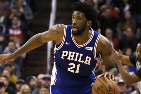 Philadelphia 76ers center Joel Embiid (21) in the first half during an NBA basketball game against the Phoenix Suns, Wednesday, Jan. 2, 2019, in Phoenix. (AP Photo/Rick Scuteri)