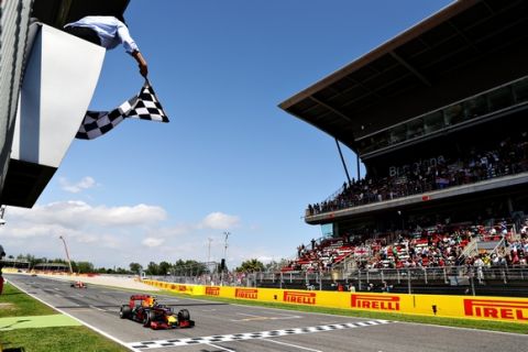 MONTMELO, SPAIN - MAY 15: Max Verstappen of the Netherlands driving the (33) Red Bull Racing Red Bull-TAG Heuer RB12 TAG Heuer takes the chequered flag for his first F1 win during the Spanish Formula One Grand Prix at Circuit de Catalunya on May 15, 2016 in Montmelo, Spain.  (Photo by Mark Thompson/Getty Images)