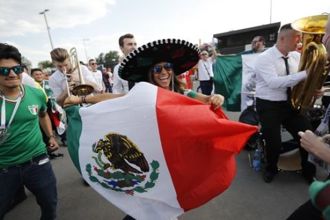 Mexico's football fans dance ahead of the group F match between Germany and Mexico at the 2018 soccer World Cup in the Luzhniki Stadium in Moscow, Russia, Sunday, June 17, 2018. (AP Photo/Alexander Zemlianichenko)