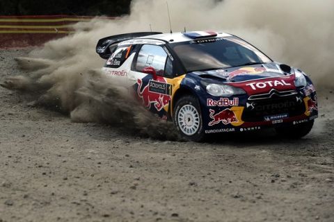 French Sebastien Loeb and co-driver Daniel Elena drive their Citroen DS3 WRC during the Agioi Theodoroi special stage of the WRC Acropolis rally in Loutraki on May 27, 2012. AFP PHOTO / ARIS MESSINIS        (Photo credit should read ARIS MESSINIS/AFP/GettyImages)