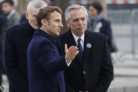 French President Emmanuel Macron, left, talks with Argentinian President Alberto Fernandez during a ceremony marking the 104th anniversary of the Nov. 11, 1918 Armistice, ending World War I, Friday, Nov. 11, 2022 in Paris. (Gonzalo Fuentes/Pool via AP)