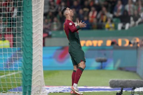 Portugal's Cristiano Ronaldo reacts after missing a chance to score during the Euro 2024 group J qualifying soccer match between Portugal and Iceland, at the Alvalade Stadium in Lisbon, Sunday, Nov. 19, 2023. Portugal won 2-0. (AP Photo/Armando Franca)