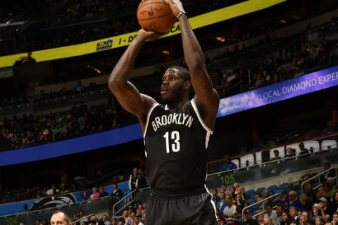 ORLANDO, FL - DECEMBER 16:  Anthony Bennett #13 of the Brooklyn Nets shoots the ball against the Orlando Magic on December 16, 2016 at the Amway Center in Orlando, Florida. NOTE TO USER: User expressly acknowledges and agrees that, by downloading and or using this Photograph, user is consenting to the terms and conditions of the Getty Images License Agreement. Mandatory Copyright Notice: Copyright 2016 NBAE (Photo by Fernando Medina/NBAE via Getty Images)