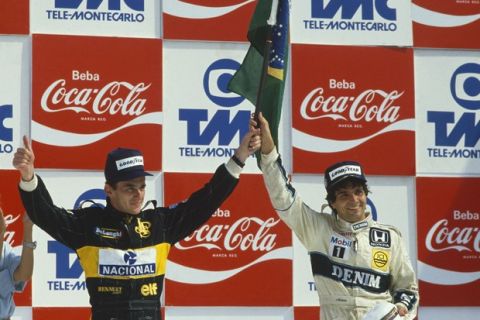 Jacarepagua, Rio de Janeiro, Brazil.
21-23 March 1986.
Nelson Piquet (Williams Honda) and Ayrton Senna (Team Lotus) celebrate home drivers finishing in 1st and 2nd positions.
World Copyright: LAT Photographic.
Ref:  Colour Transparency.