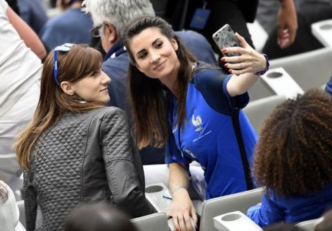 France supporters arrive ahead of the Euro 2016 group A football match between France and Romania at Stade de France, in Saint-Denis, north of Paris, on June 10, 2016. / AFP PHOTO / MIGUEL MEDINA