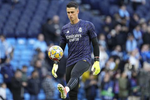 Real Madrid's goalkeeper Kepa Arrizabalaga warms up prior to the Champions League quarterfinal second leg soccer match between Manchester City and Real Madrid at the Etihad Stadium in Manchester, England, Wednesday, April 17, 2024. (AP Photo/Dave Shopland)