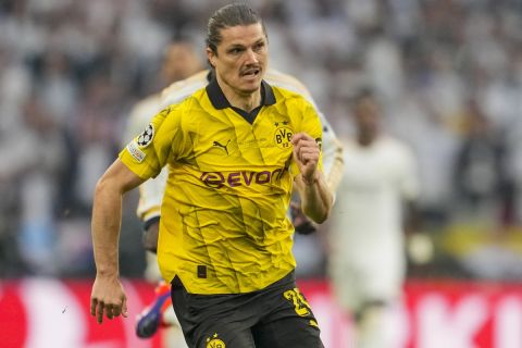 Dortmund's Marcel Sabitzer runs for the ball during the Champions League final soccer match between Borussia Dortmund and Real Madrid at Wembley stadium in London, Saturday, June 1, 2024. (AP Photo/Kin Cheung)