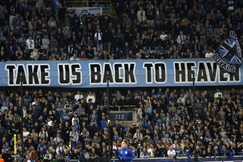 Brugge's fans show a banner during the Champions League opening phase soccer match between Club Brugge and Borussia Dortmund at Jan Breydelstadion in Bruges, Belgium, Wednesday, Sept. 18, 2024. (AP Photo/Omar Havana)