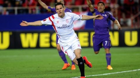 Sevilla's French forward Kevin Gameiro celebrates after scoring during the UEFA Europa League semifinal first leg football match Sevilla FC vs ACF Fiorentina at the Ramon Sanchez Pizjuan stadium in Sevilla on May 7, 2015.   AFP PHOTO/ CRISTINA QUICLER        (Photo credit should read CRISTINA QUICLER/AFP/Getty Images)