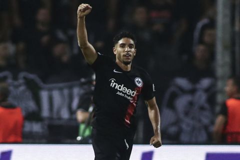 Frankfurt's Omar Marmoush celebrates after scoring his side first goal against PAOK during the Europa Conference League, group G soccer match between PAOK FC and Eintracht Frankfurt at the Toumba stadium in the northern city of Thessaloniki, Greece, Thursday, Oct. 8, 2023. (AP Photo/Giannis Papanikos)