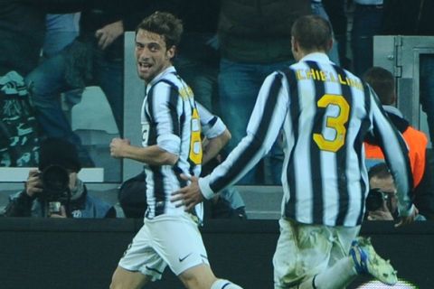 Juventus' midfielder Claudio Marchisio (L) celebrates after scoring during the Italian Serie A football match Juventus against Cesena on December 4, 2011 in Juventus stadium in Turin. AFP PHOTO / OLIVIER MORIN (Photo credit should read OLIVIER MORIN/AFP/Getty Images)