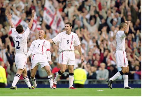 6 Oct 2001:  Gary Neville, David Beckham, Martin Keown and Rio Ferdinand of England celebrate after the World Cup Group 9 Qualifier between England and Greece at Old Trafford in Manchester, England. England sealed qualification after the game ended 2-2.\ Mandatory Credit: Gary M Prior /Allsport