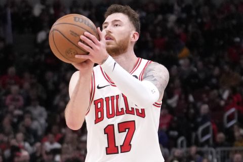 Chicago Bulls' Onuralp Bitim shoots during the first half of an NBA basketball game against the Portland Trail Blazers Monday, March 18, 2024, in Chicago.