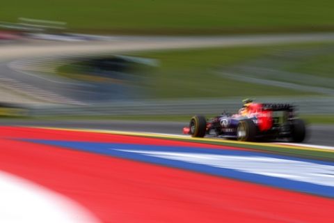 SPIELBERG, AUSTRIA - JUNE 20:  Daniel Ricciardo of Australia and Infiniti Red Bull Racing drives during practice ahead of the Austrian Formula One Grand Prix at Red Bull Ring on June 20, 2014 in Spielberg, Austria.  (Photo by Mark Thompson/Getty Images)