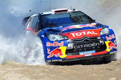 Sebastien Loeb of France and co-driver Daniel Elena of Monaco steer their Citroen DS3 WRC during the opening four special stages of the WRC rally of Italy 2011 on May 6, 2011 near Simala, on the Italian island of Sardinia. Championship leader and seven-time champion Loeb won the third and fourth special stages of the opening session after Citroen's Petter Solberg and Ford's Hirvonen had shared the opening two.  AFP PHOTO / GIUSEPPE CACACE (Photo credit should read GIUSEPPE CACACE/AFP/Getty Images)