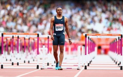 LONDON, ENGLAND - JULY 27:  Aries Merritt of the United States walks after being disqualified in the Men's 110m Hurdles Final during day two of the Sainsbury's Anniversary Games - IAAF Diamond League 2013 at The Queen Elizabeth Olympic Park on July 27, 2013 in London, England.  (Photo by Paul Gilham/Getty Images)