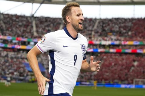 England's Harry Kane celebrates after scoring a goal during a Group C match between Denmark and England at the Euro 2024 soccer tournament in Frankfurt, Germany, Thursday, June 20, 2024. (AP Photo/Themba Hadebe)