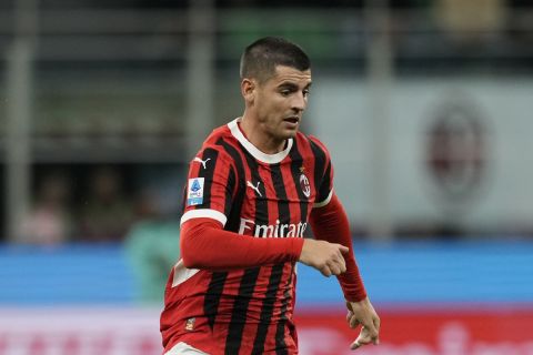 AC Milan's Alvaro Morata controls the ball during the Serie A soccer match between AC Milan and Udinese at the San Siro stadium, in Milan, Italy, Saturday, Oct. 19, 2024. (AP Photo/Antonio Calanni)