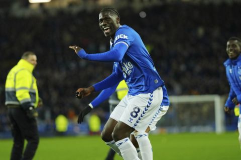 Everton's Amadou Onana celebrates after the English Premier League soccer match between Everton and Liverpool at the Goodison Park stadium in Liverpool, Britain, Wednesday, April 24, 2024. Everton won 2-0. (AP Photo/Jon Super)