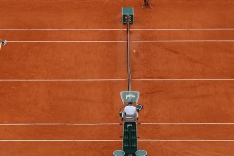 Austria's Dominic Thiem, left, plays a shot against Spain's Rafael Nadal during the men's final match of the French Open tennis tournament at the Roland Garros stadium in Paris, Sunday, June 9, 2019. (AP Photo/Pavel Golovkin)