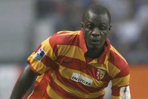 Lens' forward Gauthier Akale runs during their French L1 football match, 19 August 2007 at the Felix-Bollaert stadium in Lens. AFP PHOTO DENIS CHARLET