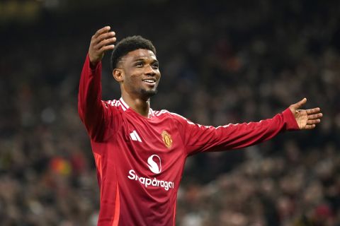 Manchester United's Amad Diallo celebrates after scoring his side's second goal during the Europa League opening phase soccer match between Manchester United and PAOK at the Old Trafford stadium in Manchester, England, Thursday, Nov. 7, 2024. (AP Photo/Dave Thompson)