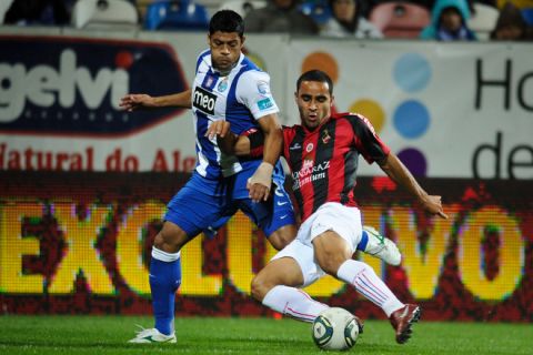 FC Porto's Brazilain forward Givanildo de Sousa "Hulk" (L) fights for the ball with Olhanense's Brazilian defender Ismaily dos Santos on November 5, 2011 during a Portuguese league football match at the Jose Arcanjo Stadium in Olhao. AFP PHOTO/ PATRICIA DE MELO MOREIRA (Photo credit should read PATRICIA DE MELO MOREIRA/AFP/Getty Images)