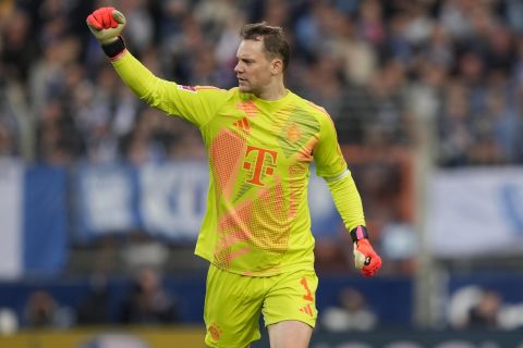 Bayern's goalkeeper Manuel Neuer celebrates after a goal during the German Bundesliga soccer match between VfL Bochum and Bayern Munich in Bochum, Germany, Sunday, Oct. 27, 2024. (AP Photo/Martin Meissner)