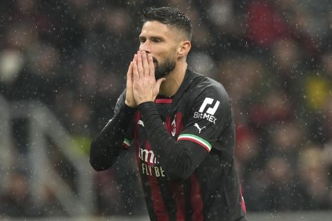 AC Milan's Olivier Giroud reacts during the Serie A soccer match between AC Milan and Roma at the San Siro stadium, in Milan, Italy, Sunday, Jan. 8, 2023. (AP Photo/Antonio Calanni)